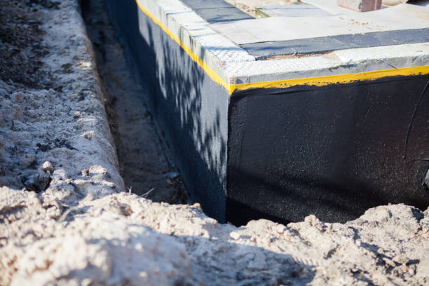 Professional Emergency Waterproofing technician working in Alfred, NY